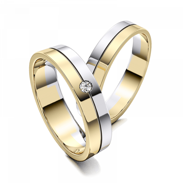 Свадебные кольца из белого и желтого золота фотография